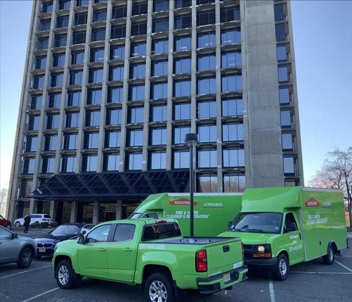 green fleet at high-rise parked